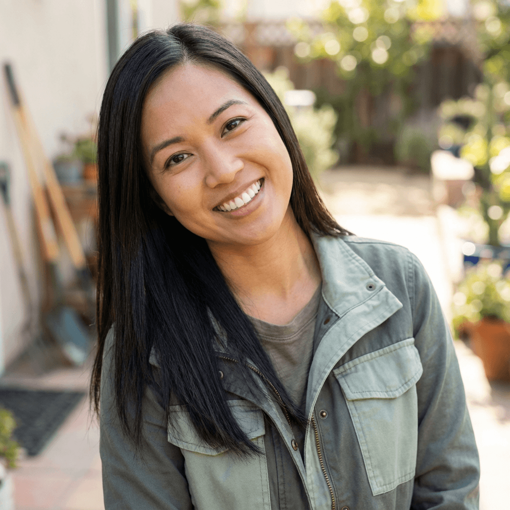 Maya Chen, scheduling coordinator, at a desk with a headset and calendar